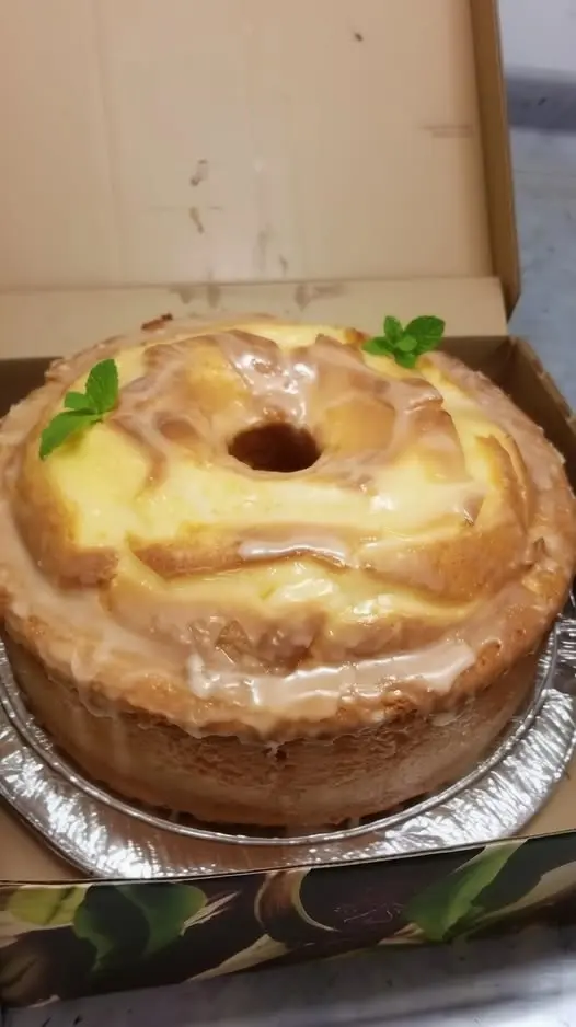 A perfectly sliced buttermilk pound cake showing the tight, velvety crumb