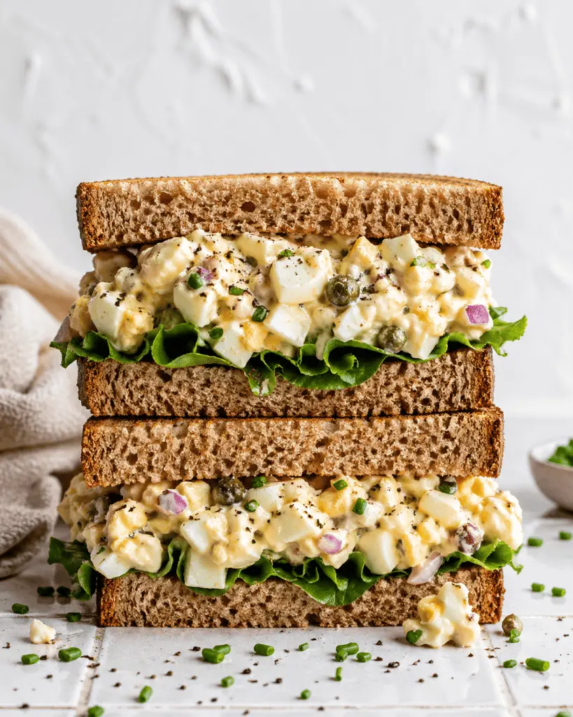 Egg salad sandwich on toasted bread with lettuce