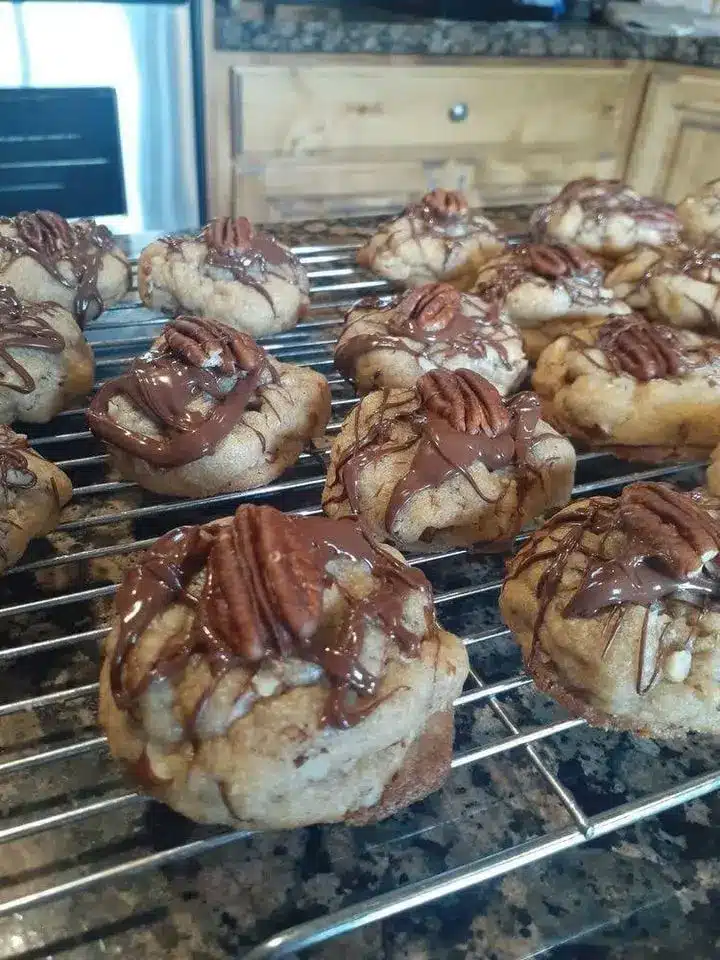 Stack of butter pecan cookies showing the chewy texture and toasted nuts