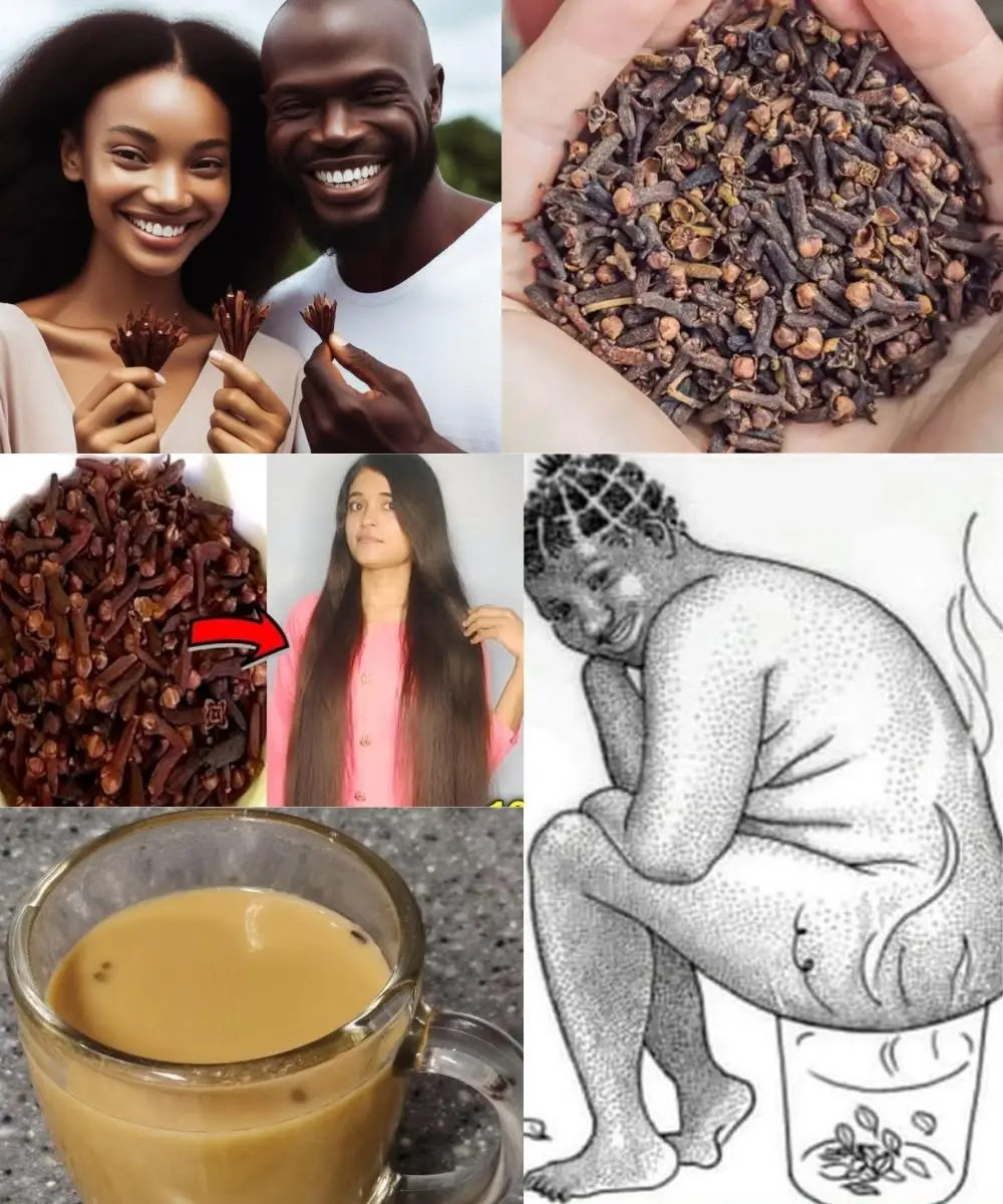 Whole cloves scattered next to a cup of warm clove tea on a rustic wooden table.