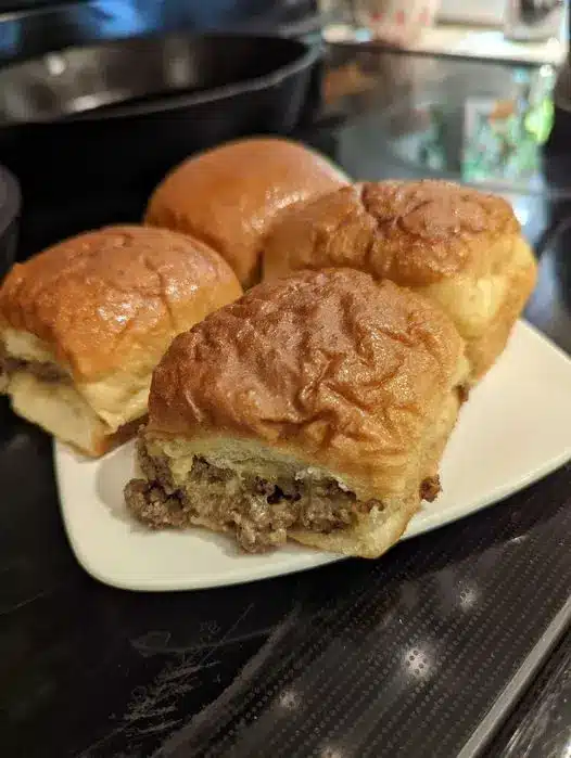 Maid Rite loose meat sliders served with pickles and fries