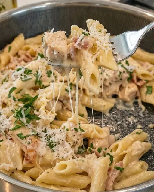 Finished creamy chicken carbonara casserole in a baking dish