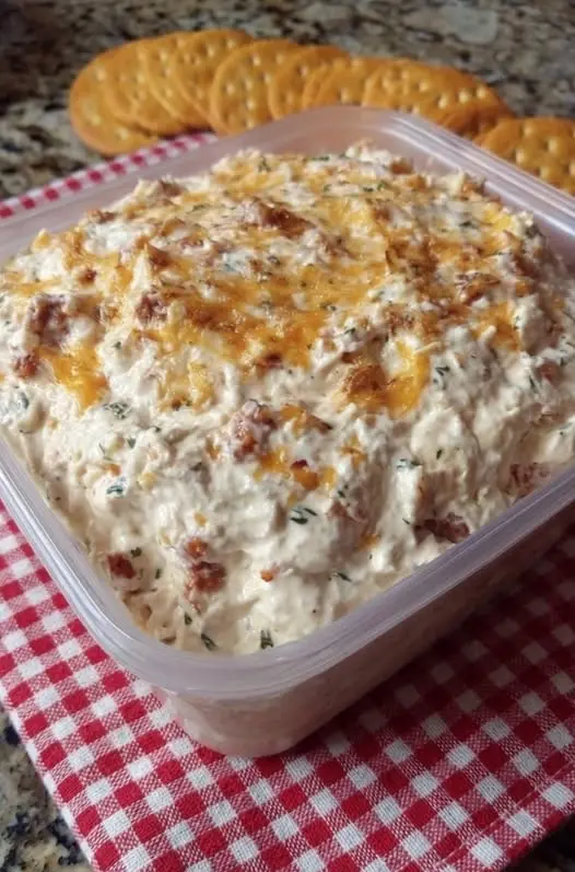 A scoop of banana pudding with golden toasted meringue on top