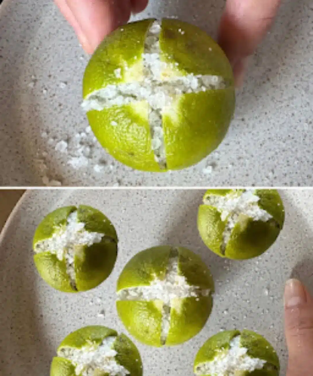 Several sliced limes with salt arranged on a stone platter with fresh herbs for home wellness.