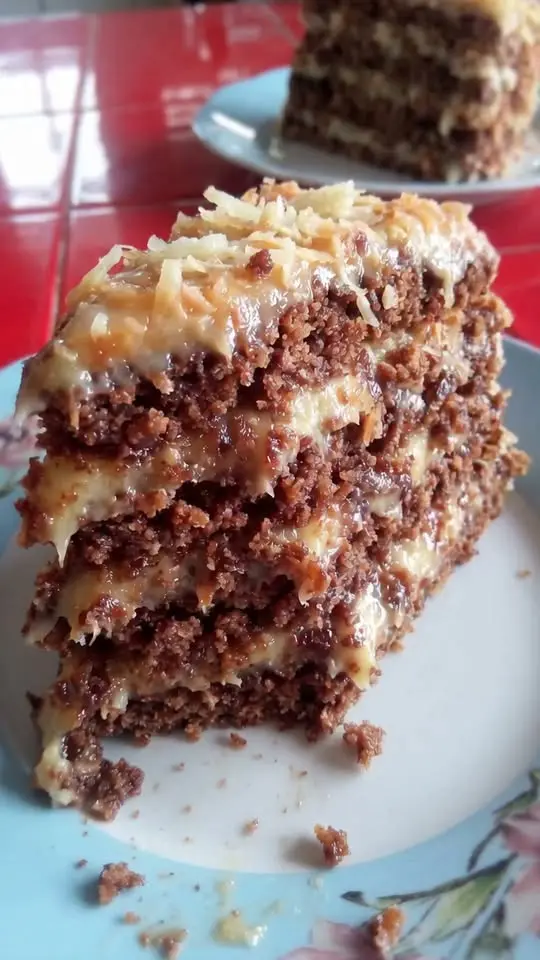 Slices of Southern butter pecan cake on a serving plate
